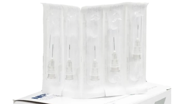 A pack of Nipro 10cc (10ml) 27G x 1/2" Luer-Lock Syringe and Hypodermic Needle Combo (25 pack) sitting on top of a box.